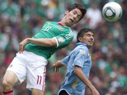 Foto del jugador Marco Bueno mostrando su habilidad con el balón durante la pasada Copa Sub-17. MEXSPORT  /