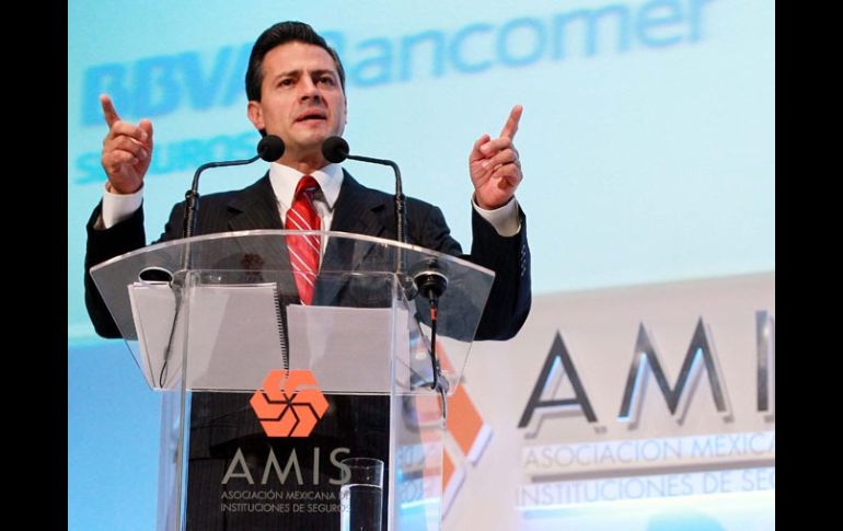 Enrique Peña Nieto, durante su participación en la XXII Convención de Aseguradores de México. NOTIMEX  /