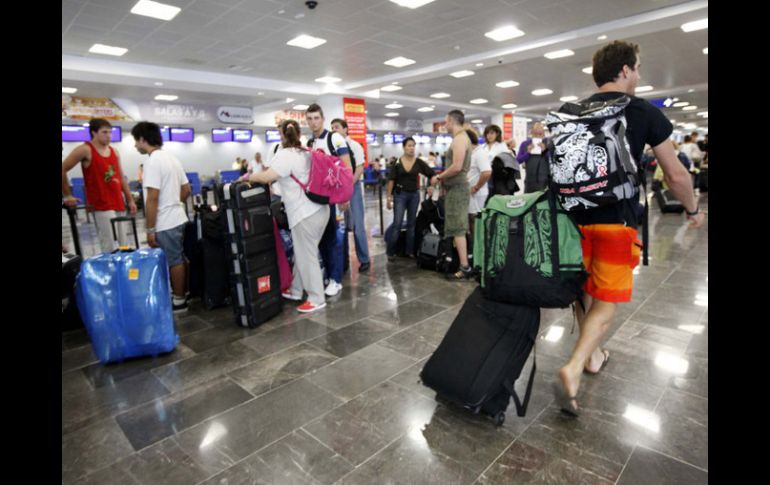 La Sectur indica que el arribo de turistas internacionales vía aérea creció 3.3% en relación al mismo periodo de 2011. ARCHIVO  /