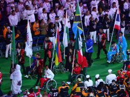 Abanderados de las distintas delegaciones participantes en los Juegos, desfilan durante ceremonia de clausura. NOTIMEX  /