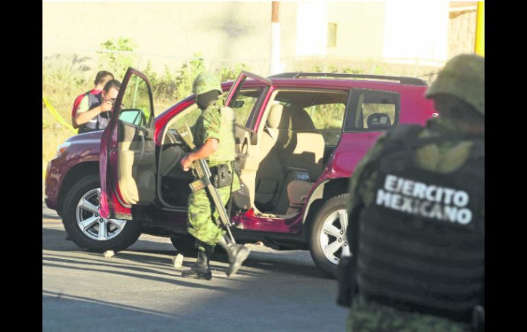 Intensa movilización. Tras el asesinato del secretario de Turismo, elementos del Ejército Mexicano llegaron a la zona de los hechos. EL INFORMADOR /