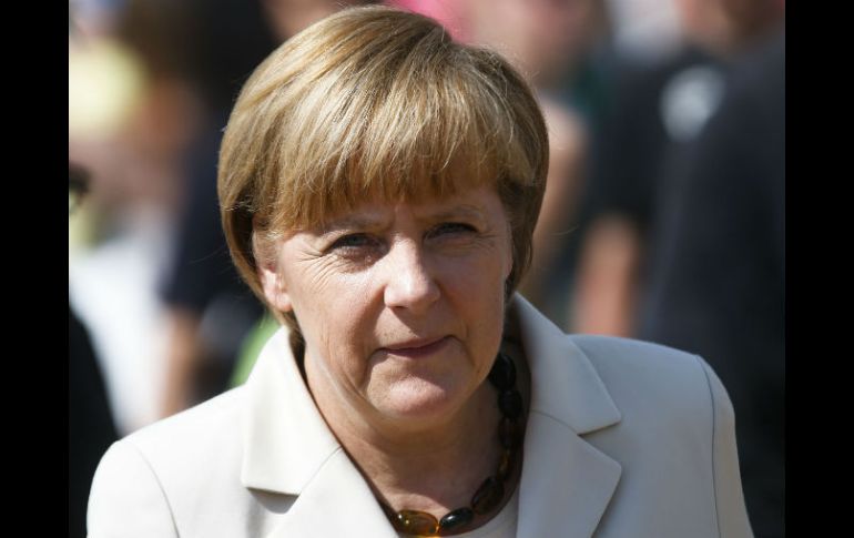 La canciller alemana Ángela Merkel hablará con el presidente de EU para aclarar la situación. AP /