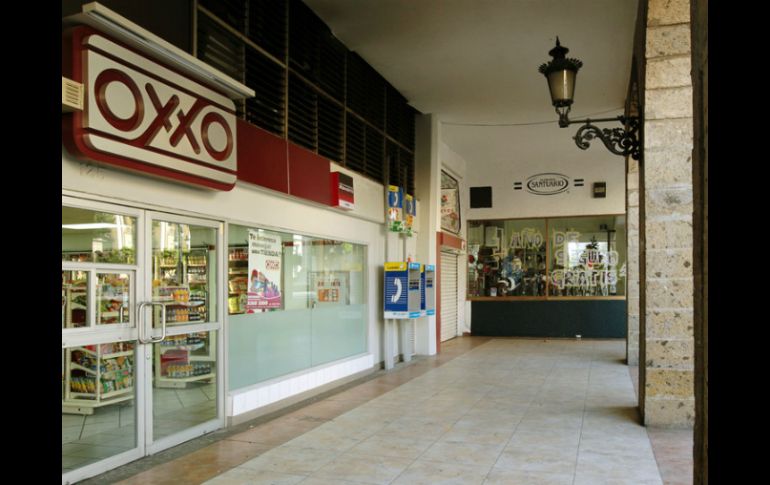 Directivos de Femsa aseguraron que cumplirán la meta de apertura de tiendas OXXO para 2013. ARCHIVO /
