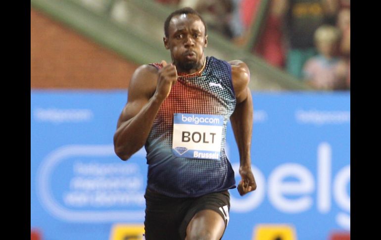 Usain Bolt sigue dejando atrás a Justin Gatlin. AP /