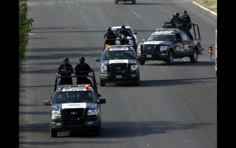 La Policía Federal ayer tomó control de la seguridad de Apatzingán y Uruapan. AFP /