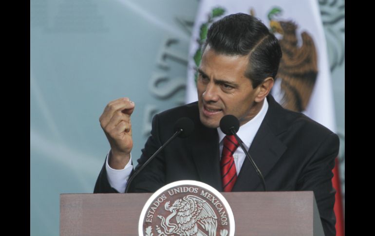 Enrique Peña Nieto asegura que la violencia y el crimen han reducido desde que asumió el poder en diciembre de 2012. ARCHIVO /