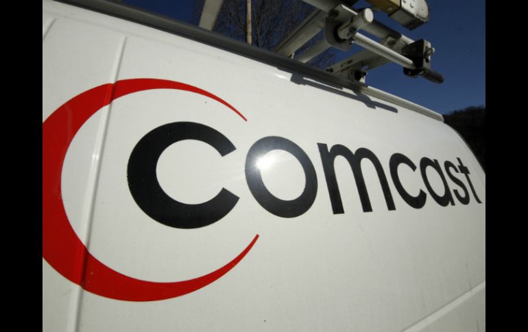 Comcast tiene 22 millones de clientes de televisión; Time Warner Cable registra 11 millones de suscriptores de video. AP /