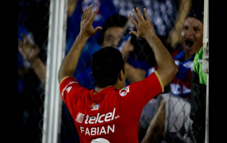 Los goles de Fabián en los últimos partidos han dado puntos valiosos a los Celestes. AFP /