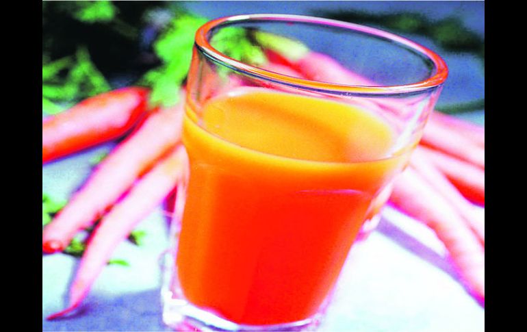 Jugo. El zumo fresco de zanahoria puede prevenir el aumento de grasa en tu cuerpo, porque genera esa sensación de saciedad.  /