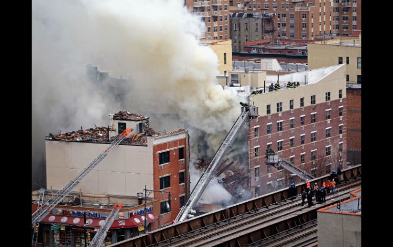 La explosión por una fuga de gas provocó el derrumbe de dos edificios en el barrio de Harlem. AFP /