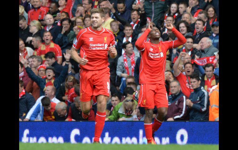 Sin dos de sus flamantes refuerzos, Liverpool logró sacar la victoria. AFP /