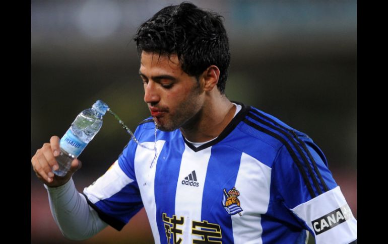 Carlos anotó un gol al Atlético, campeón de España y su equipo ganó el juego. AFP / ARCHIVO