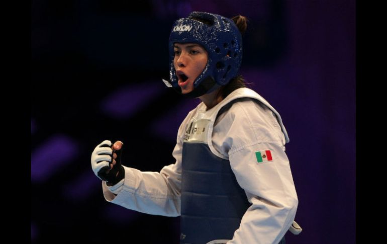 María del Rosario Espinoza se coronó como flamante campeona de los JCC 2014. EFE / A. Cruz