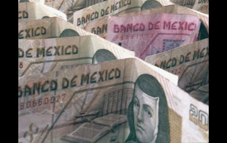 La mejora económica de EU y las coberturas petroleras fortalecen a la moneda mexicana. EL INFORMADOR / ARCHIVO