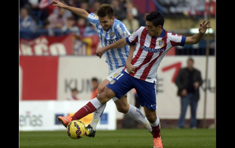 El mexicano Raúl Jiménez tuvo acción en el partido de hoy en el que su equipo logra el triunfo sobre el Málaga. AFP / G. Julien