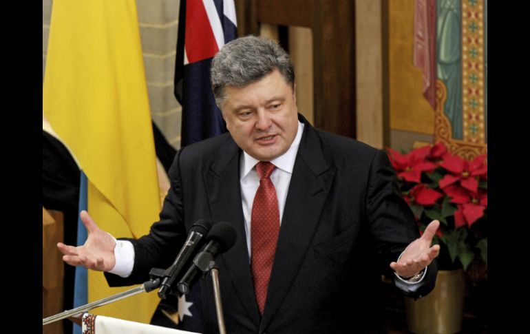Petro Poroshenko advierte que el acuerdo aún es frágil. AP / M. Fairclouhg