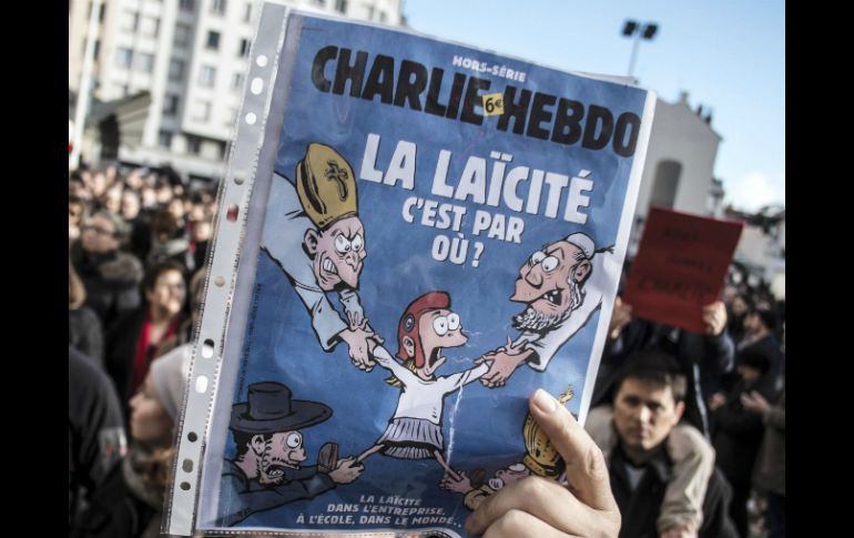 La muestra reúne ediciones originales de 'Charlie Hebdo' desde su fundación en 1992. AFP / P. Ksiazek