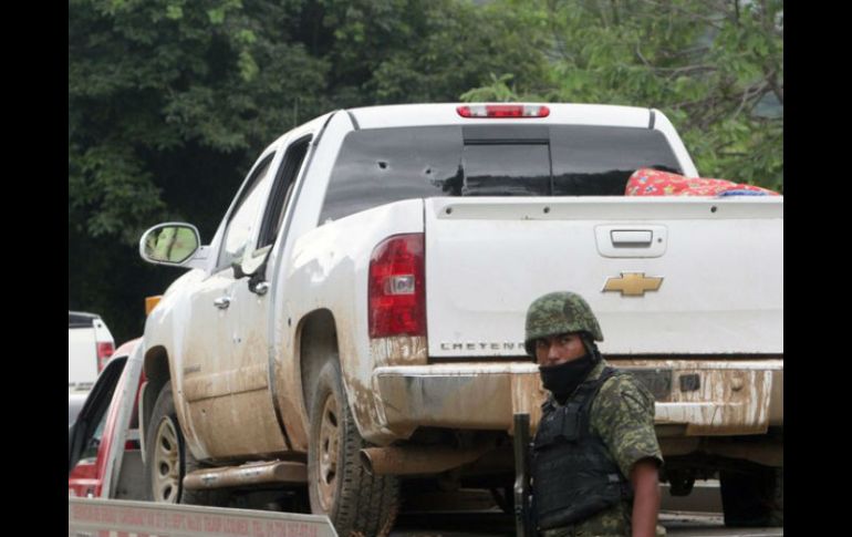 En el enfrentamiento entre civiles y militares,  murieron 14 personas; ocho más fueron asesinadas por tres de los soldados. AFP / ARCHIVO
