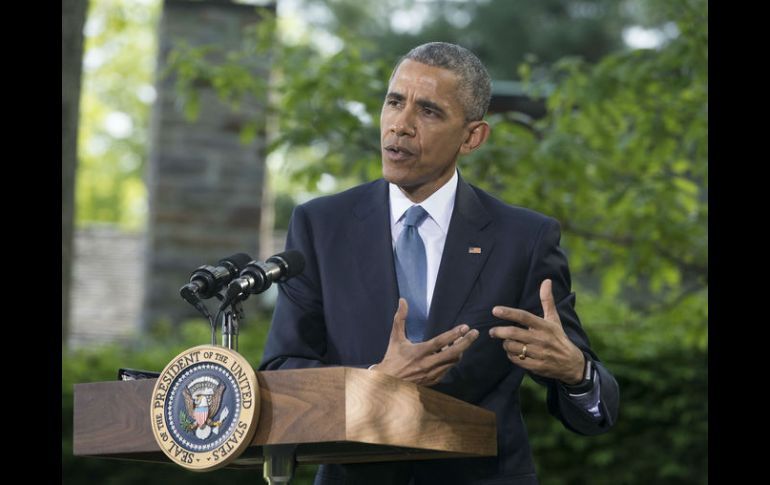 Anfitrión. Barack Obama, ayer en Campo David. AP /