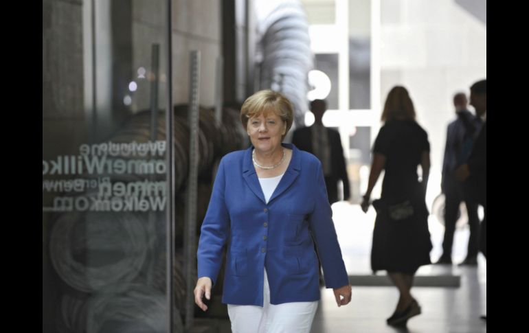 Merkel dice que se pueden extender los plazos de pagos y modificar las tasas de interés de la deuda griega. EFE / J. Detmers