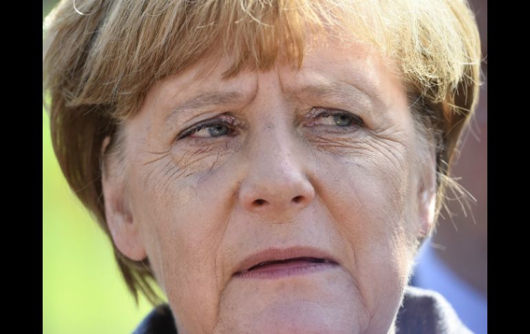 ''Es vergonzoso y repulsivo lo que experimentamos aquí'', dice Merkel en relación a los disturbios del fin de semana. AFP / T. Schwarz