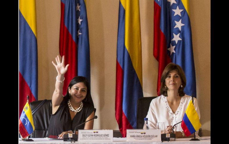 Holguín, de Colombia, y la venezolana Rodríguez determinan reuniones para fijar protocolos a deportaciones. AFP / J. Sarmiento