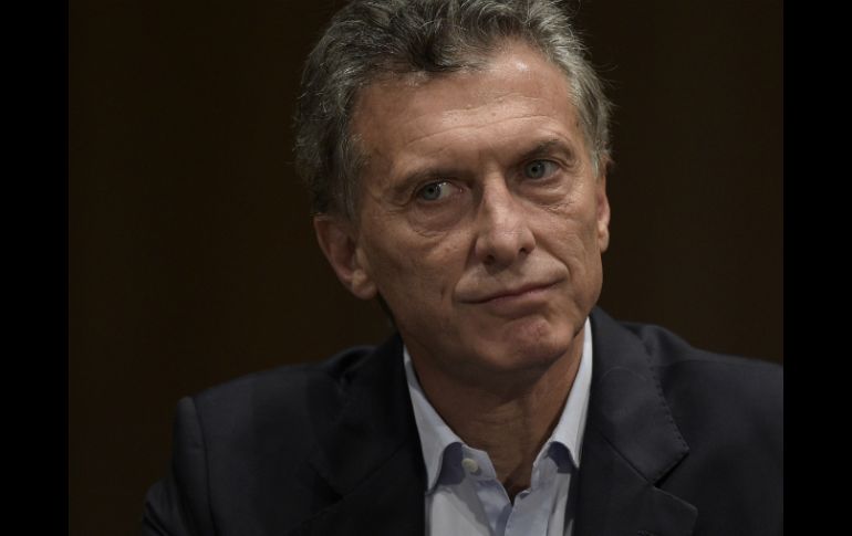 La casa presidencial agregó que el presidente electo Mauricio Macri agradeció la llamada. AFP / J. Mabromata