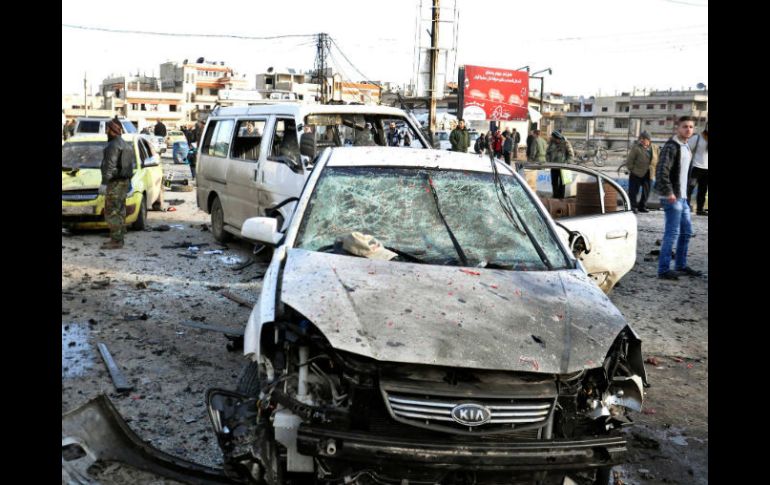 Explosión en un retén del gobierno. El diario 'Cumhuriyet' afirmó que Turquía vende armamento a los rebeldes sirios. AP /