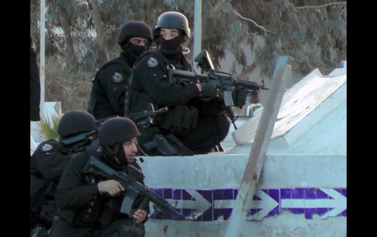 Un escuadrón en posición, durante el enfrentamiento en Ben Guerdan. AFP / F. Nasri