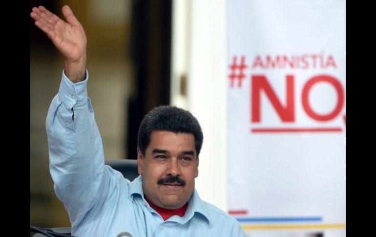 'Aprobado, ley de amnesia criminal no va', afirma Maduro. AFP / J. Barreto
