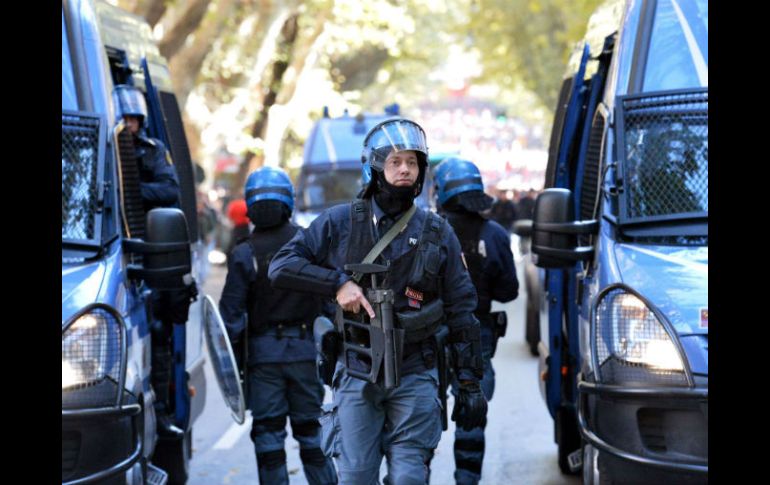 Agentes de la policía de las ciudades de Milán, Lecco y Varese participaron en las acciones. AFP / ARCHIVO