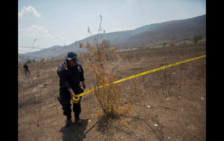 Los cuerpos fueron encontrados la semana pasada en una brecha poco transitada entre Coacoyula y Apipilulco. AFP / ARCHIVO