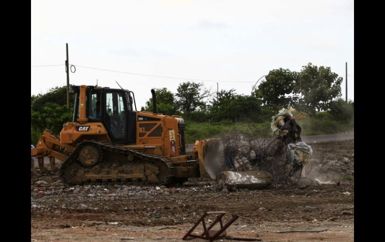 Correa realizó un recorrido por las zonas afectadas en Manabí, donde ya se perfilan las labores de reconstrucción. EFE / ARCHIVO