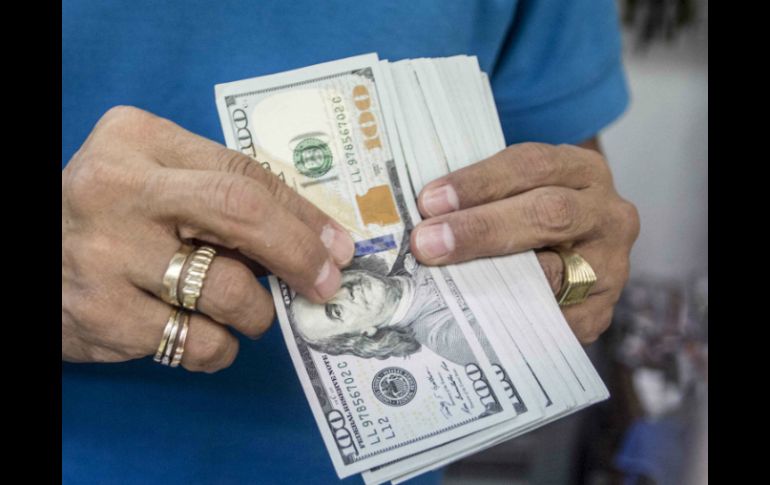 El Banxico informa que el tipo de cambio para solventar obligaciones es de 18.9113 pesos. EL INFORMADOR / ARCHIVO
