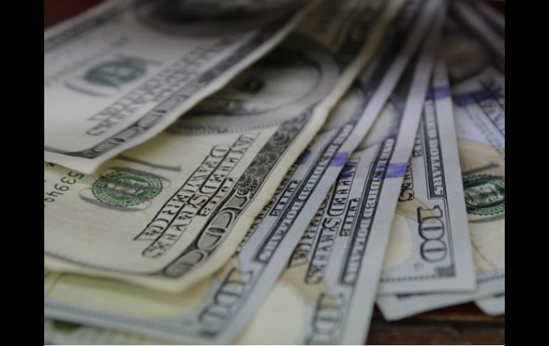 El Banxico fija el tipo de cambio para solventar obligaciones denominadas en moneda extranjera en 18.8691 pesos. EL INFORMADOR / ARCHIVO