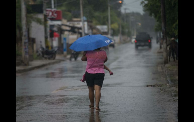 La Conagua y el SMN exhortan a la población a mantenerse informada sobre las condiciones meteorológicas. EFE / C. Moreno