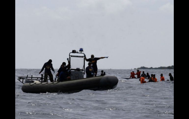 Rescatistas y volunatrios continúan la busqueda de las decenas de personas aún desaparecidas. AP / ARCHIVO