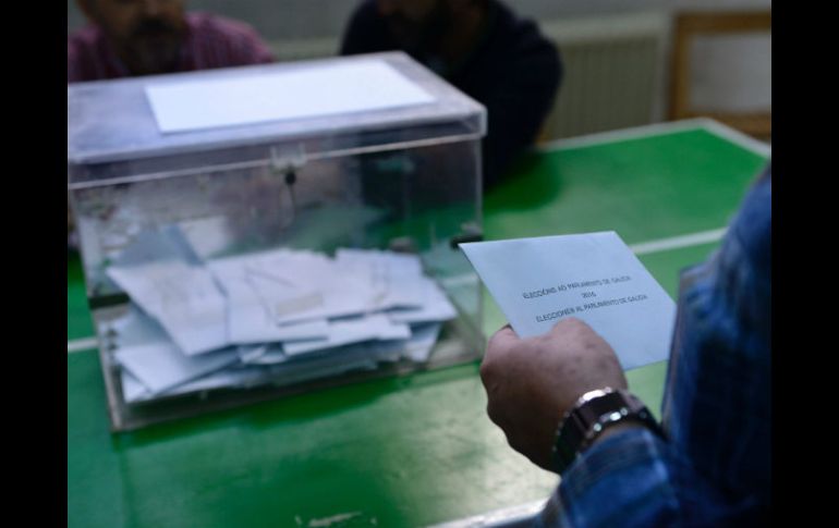 El partido conservador seguiría gobernando, en base a los primeros resultados tras cierre de urnas. AFP / M. Riopa