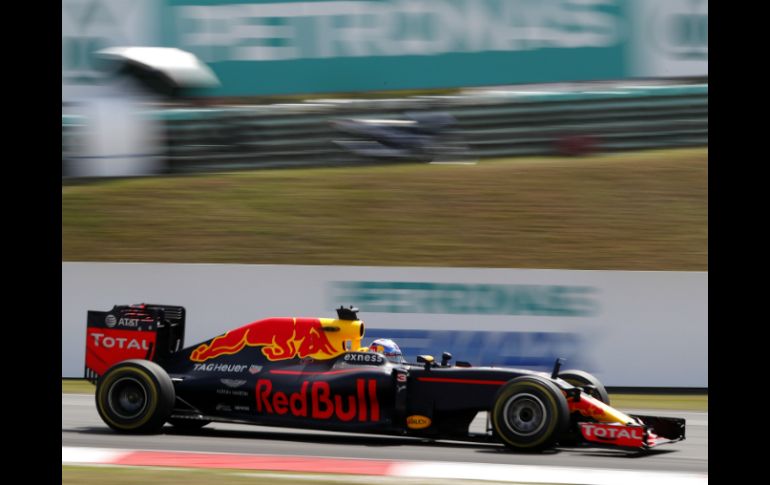 Ricciardo consiguió la cuarta victoria de su carrera en la categoría. AP / V.THIAN