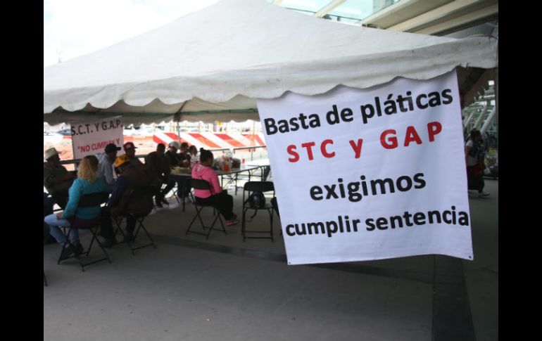En las últimas dos semanas, los ejidatarios tomaron las instalaciones del estacionamiento del aeropuerto. EL INFORMADOR / ARCHIVO
