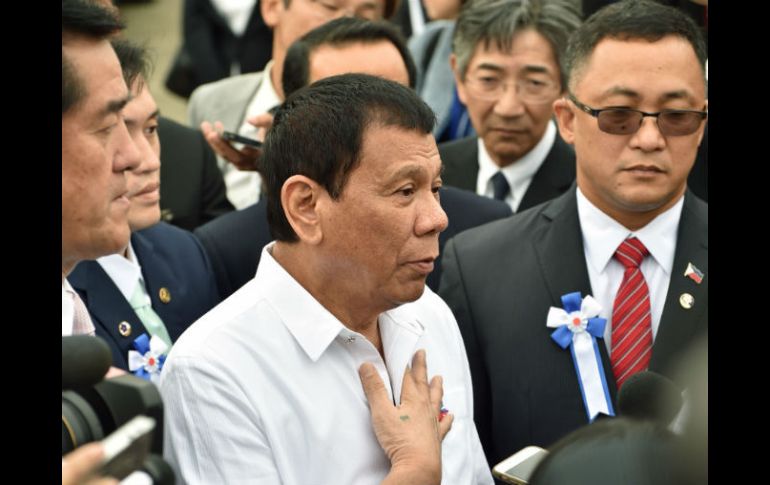 El presidente filipino concluyó hoy una visita de tres días a Japón. AFP / K. Nogi