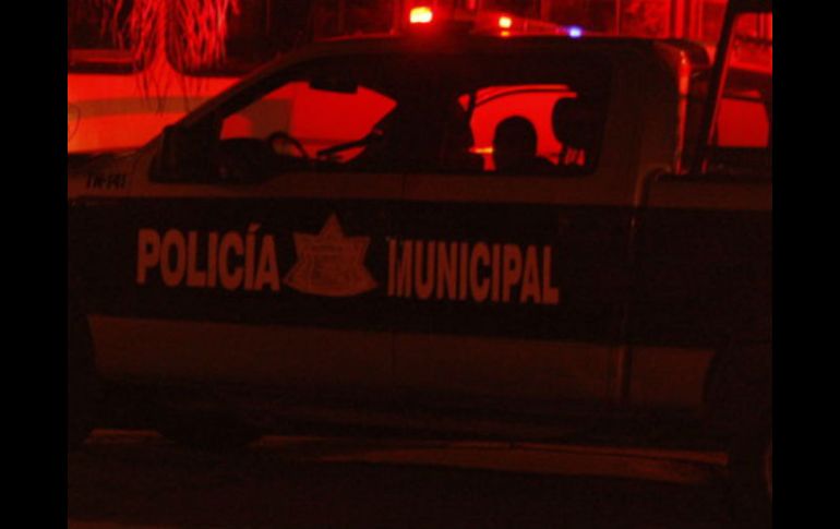Los policías esperaron la llegada del Ministerio Público para iniciar las investigaciones. EL INFORMADOR / ARCHIVO