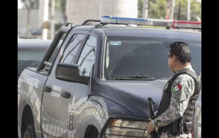 Elementos de la Fiscalía General del Estado inician las investigaciones sobre la muerte de las cinco personas. EL INFORMADOR / ARCHIVO