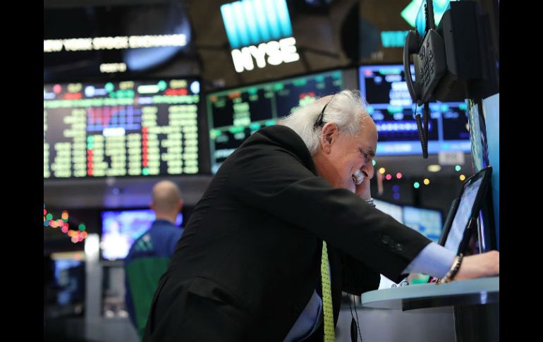 El Dow Jones, el principal índice de Wall Street, cedió 0.60% hasta 19 mil 792.66 unidades. AFP / S. Platt