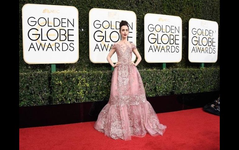 Lily Collins portó un Zuhair Murad Couture que la encumbraba como una de las mejores vestidas de la noche. AFP / F. Harrison