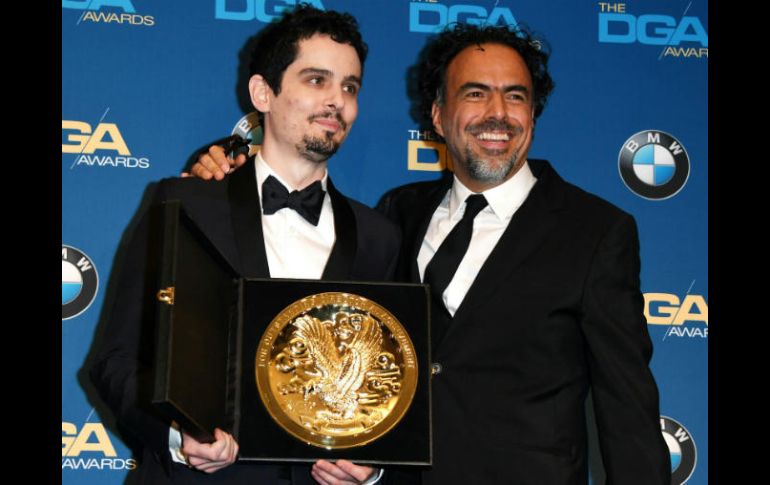 El cineasta entregó el premio a Damien Chazelle, ganador de este por 'La La Land'. AFP / M. Ralston