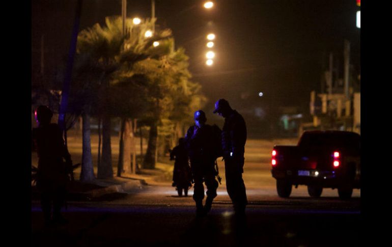 La PJE declinó comentar si los hechos de violencia están relacionados con la presencia de un grupo armado en Villa Juárez. AP / ARCHIVO