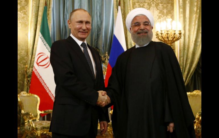 Hasan Rohani de Irán y Vladimir Putin de Rusia, destacan intensificación de actividades terroristas en diferentes regiones del planeta. EFE / S. Karphukhin