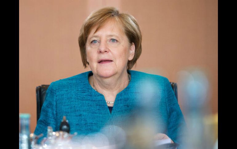 Merkel dice que se espera que el partido que fue reprogramado para este miércoles sea ''pacífico y bueno''. AFP / S. Loss