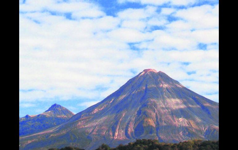 Uno de los atractivos de Colima, con sus espectaculares volcanes y el cielo plagado con un tapiz de nubes. ESPECIAL / Gobierno de Colima